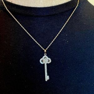 Like New 1/3CTW White Diamond Key Pendant